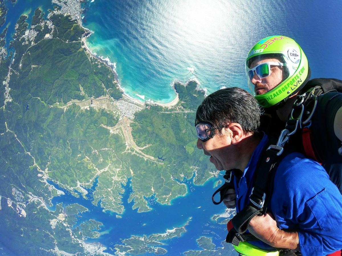 Joe in freefall on a tandem skydive, 10,000ft over the coast of Japan